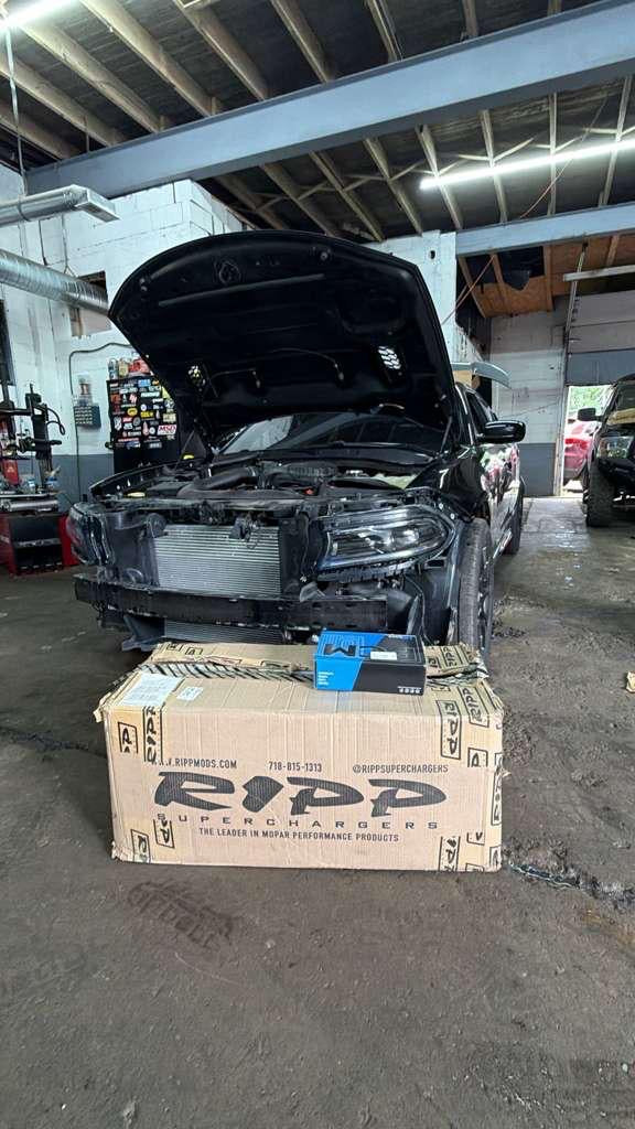 Dodge Charger prepared for RIPP supercharger installation at Falcon Garage in Columbus, Ohio