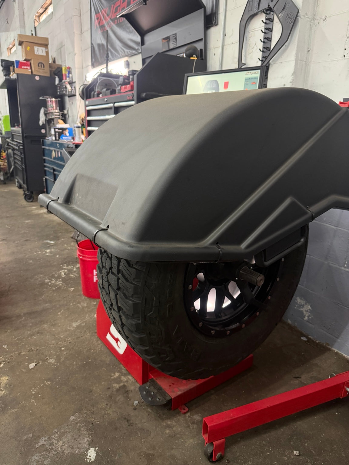 Professional wheel balancing process using Snap-on equipment at Falcon Garage