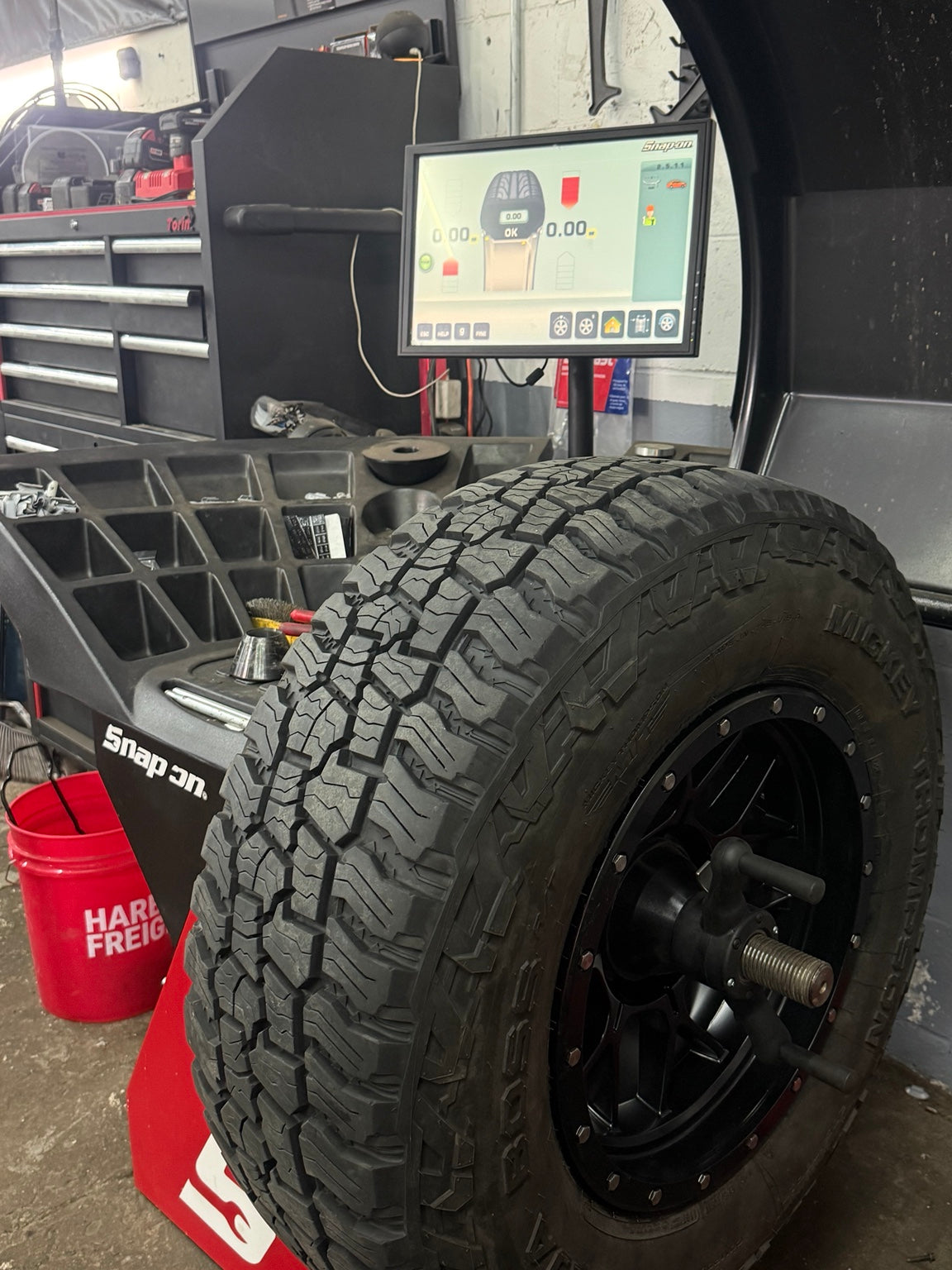 Road Force balancing an off-road wheel and tire at Falcon Garage in Columbus Ohio