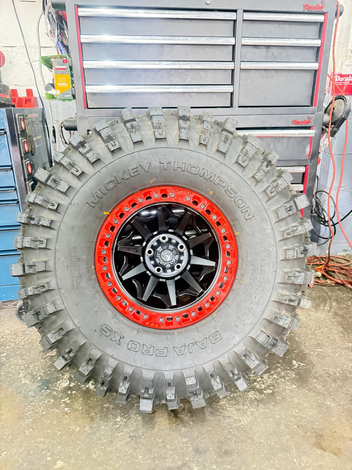 Aftermarket beadlock wheel and off-road tire fitment at Falcon Garage Columbus Ohio