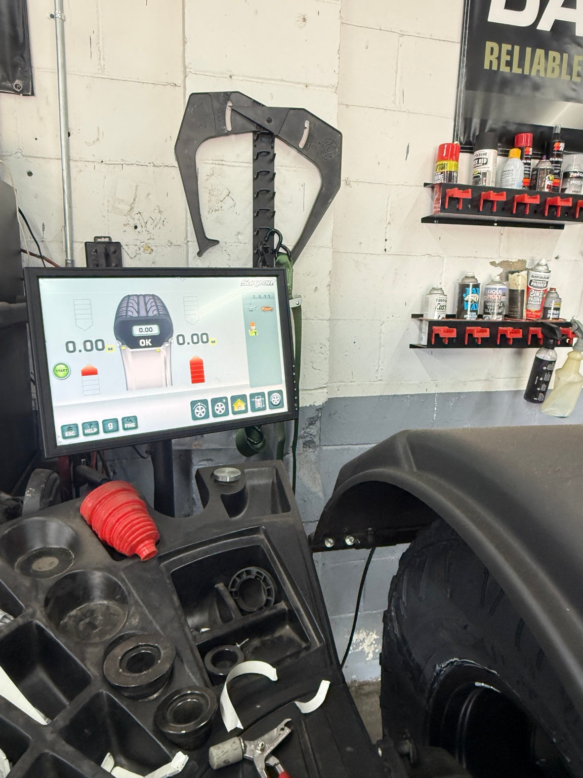 Road Force balancing measurements displayed during wheel and tire service