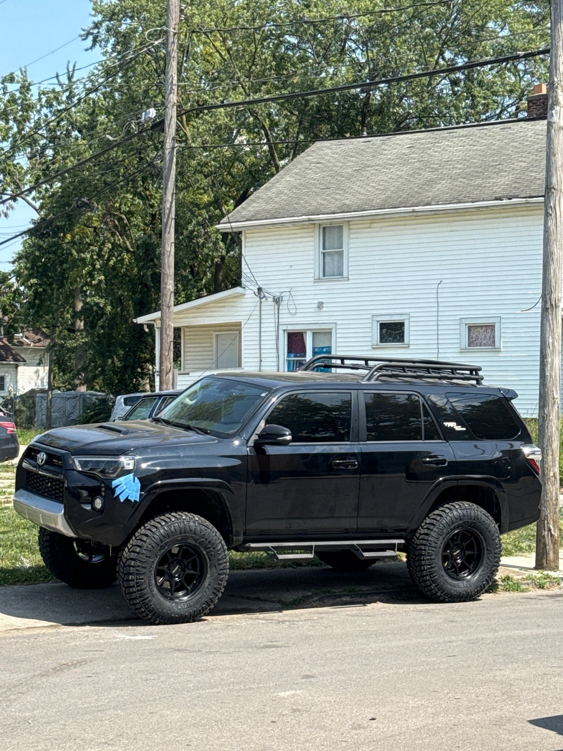 Black lifted Toyota 4Runner with off-road wheels and tires in Columbus, Ohio